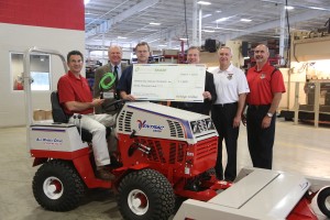 Presenting the award is second from left, Carl Andre, Director of Bus. Dev. Efficiency Smart. Accepting the award from left to right are Dallas Steiner, Pres of Ventrac; Mark Steiner, Vice Pres of Ventrac; Mayor of Orrville, Dave Handwerk; Jeff Brediger, Director of Orrville Utilities; and Mike Hedberg, Marketing Manager, City of Orrville
